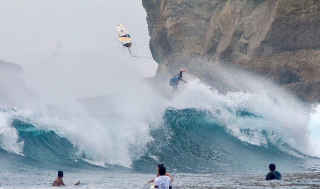 Surfer wiping out