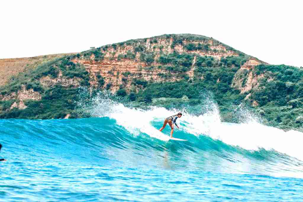 female surfer