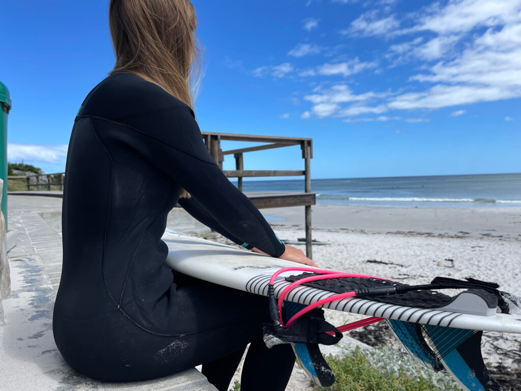 Surfboard traction pad